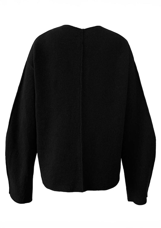 Relaxed Women's sweater with a V-neckline and visible seam details on sleeves, front and back, knit in a black RWS Merino wool