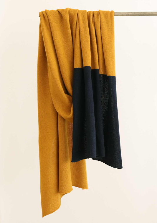 Fine knit wide cashmere blend scarf in mustard with a navy striped end