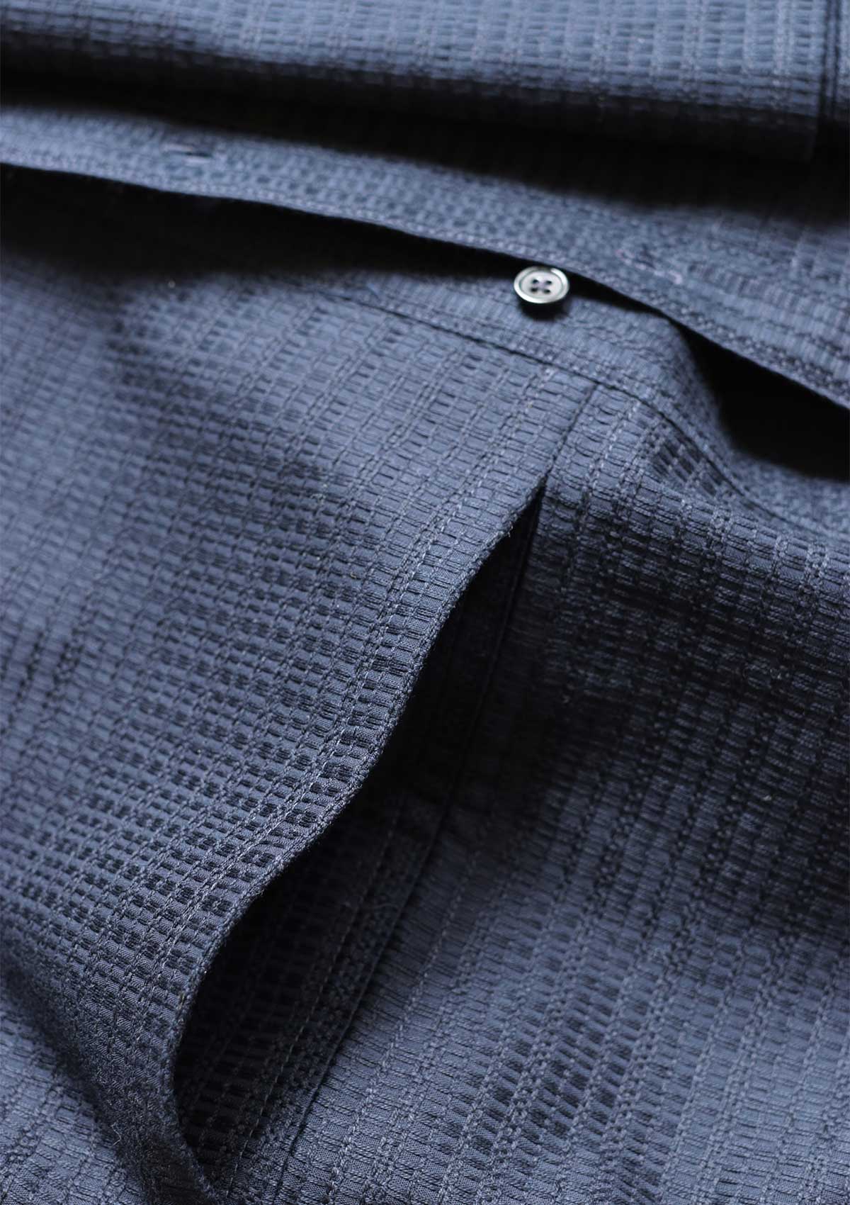 Pocket detail of navy textured cotton overshirt by Leophil